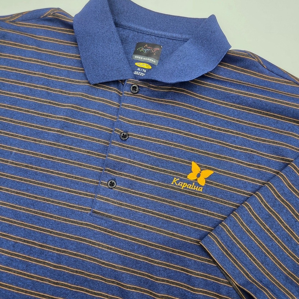 GREG NORMAN KAPALUA GOLF COURSE POLO MENS XL BLUE YELLOW STRIPED HAWAII DRY EUC